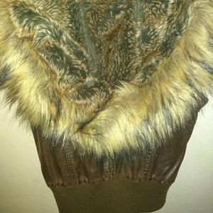 Cute womens faux leather vest with removable hood.